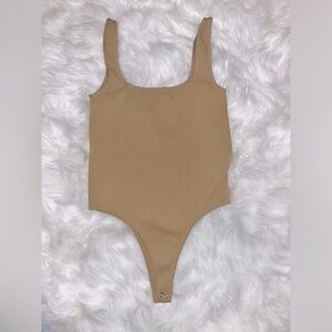 Tan Body suit